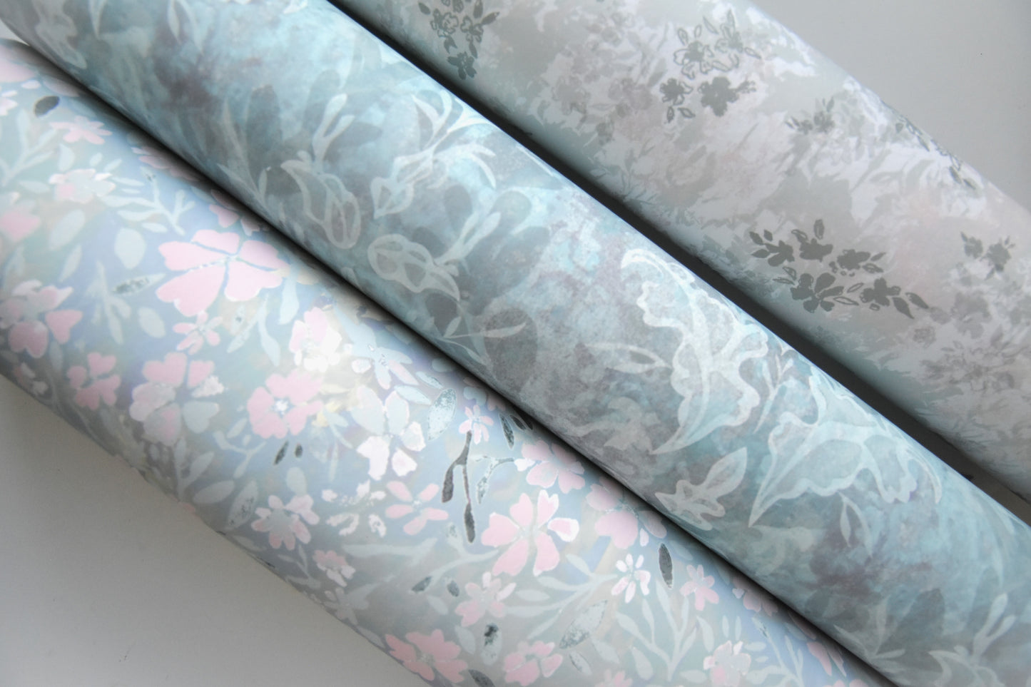 'Fanciful' wallpaper in pastel blues and greys