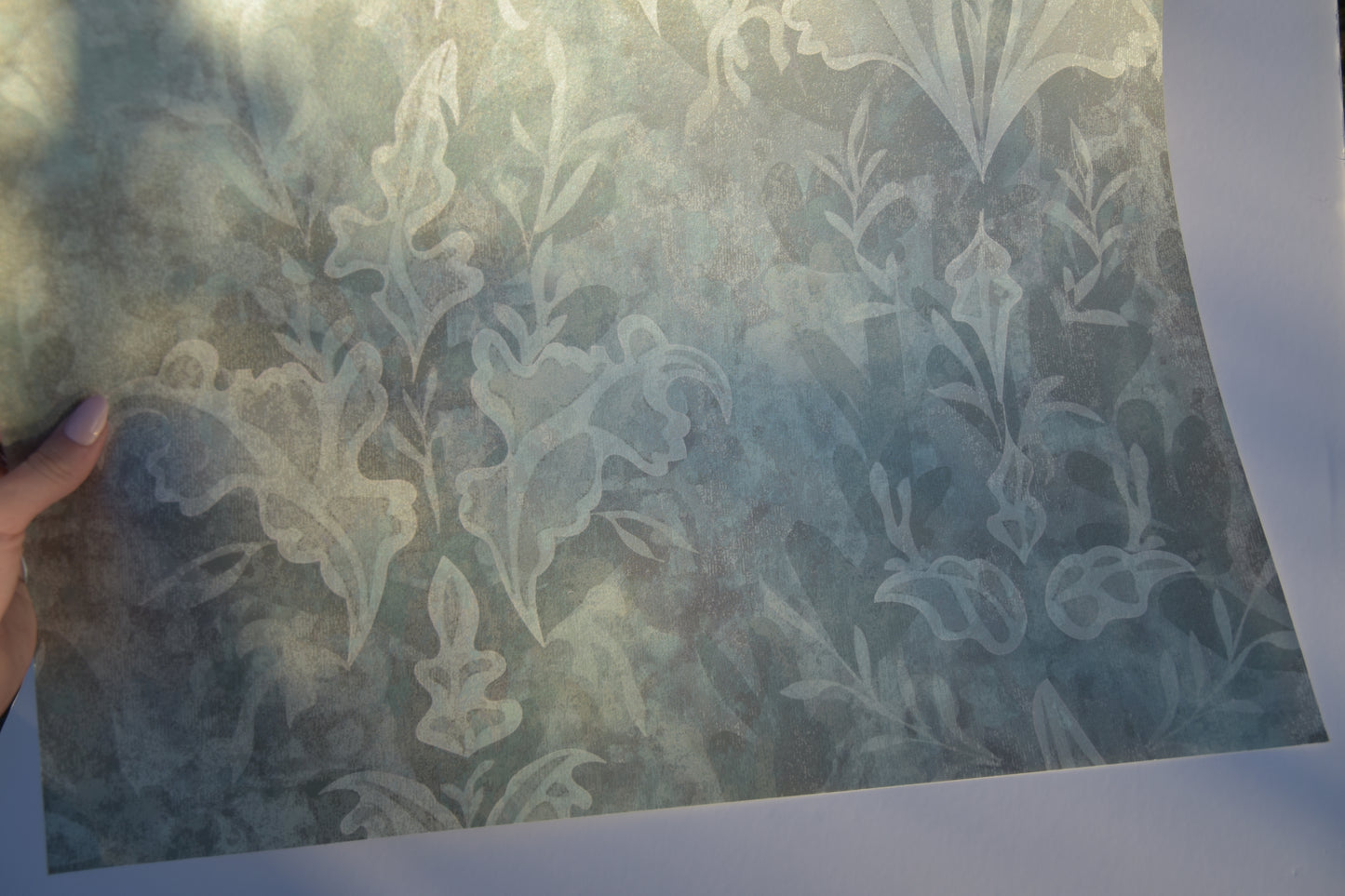 'Fanciful' wallpaper in pastel blues and greys