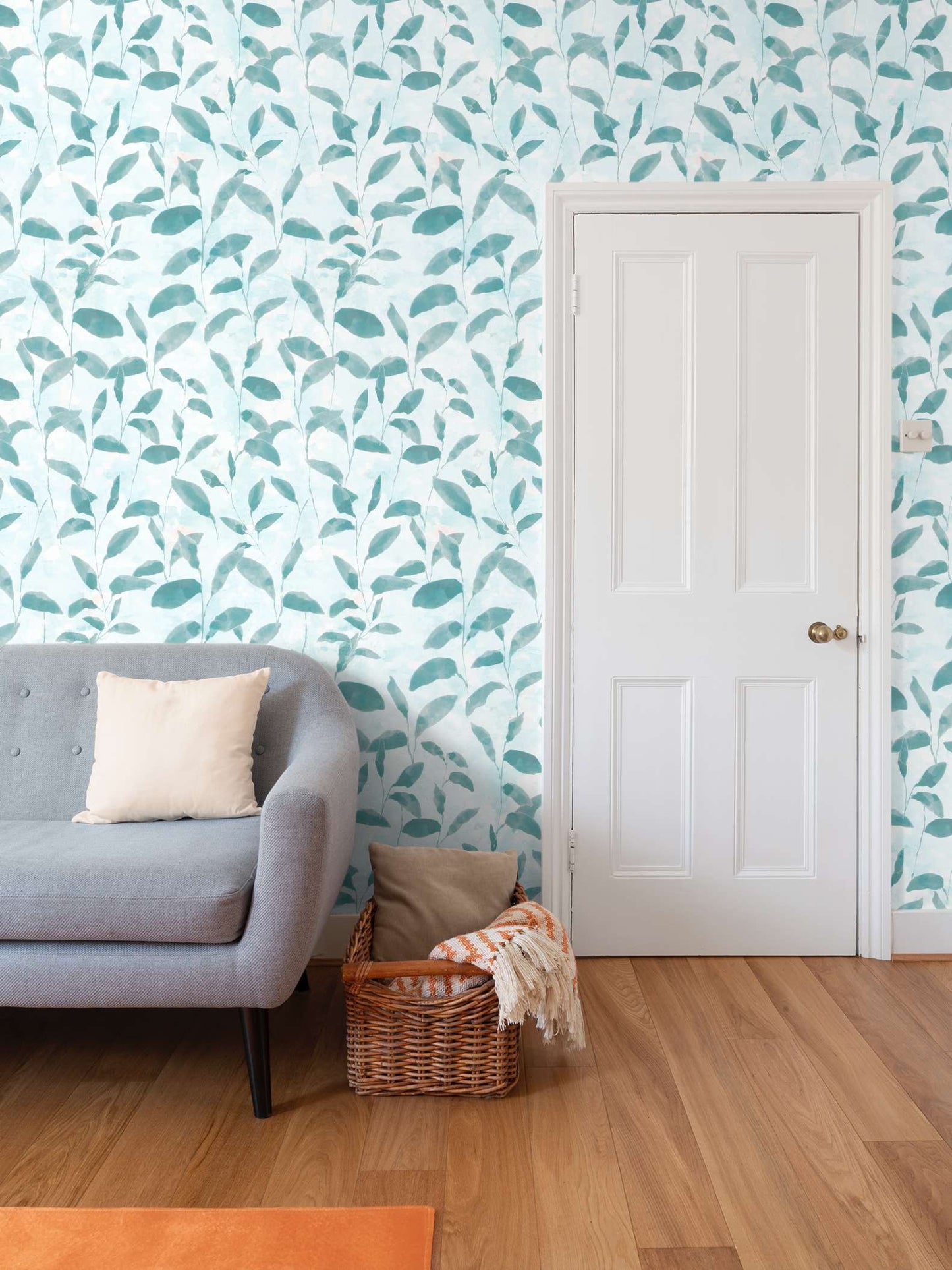 'Leafy glade' wallpaper in green